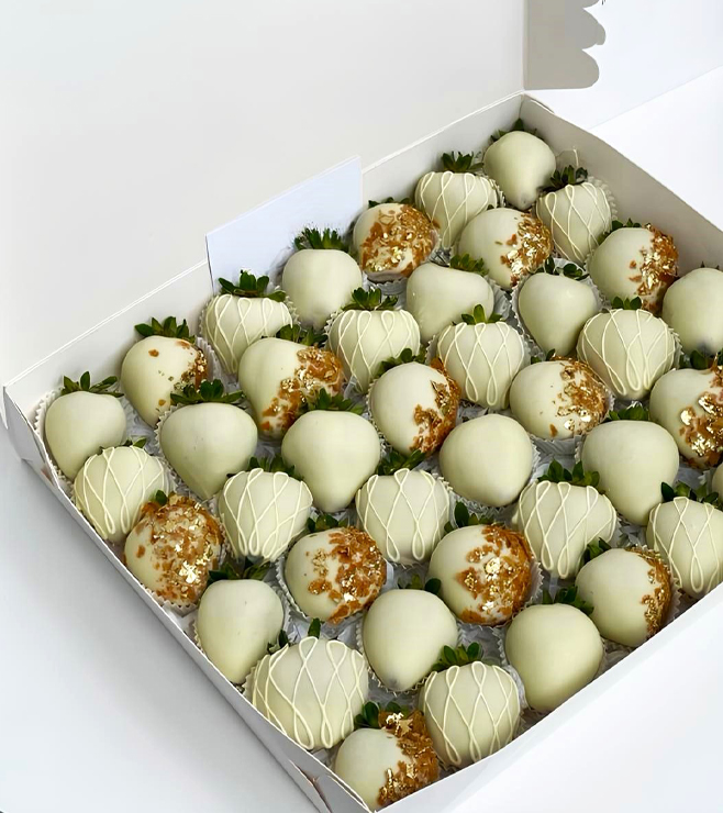 فراولة مغموسة بالشوكولاتة الذهبية الأنيقة