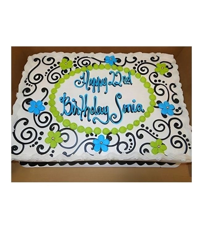 كعكة عيد ميلاد مزينة بزهور متفتحة