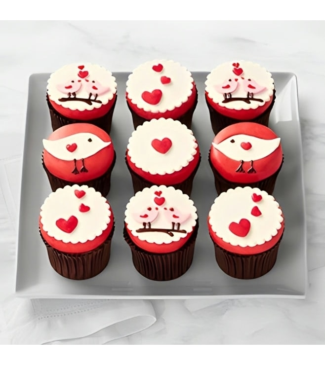 طائران في حالة حب دزينة من الكب كيك