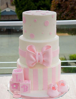Centered Pink Bow Tiered Cake