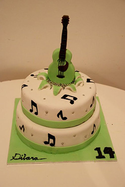 Green & White Musician Cake