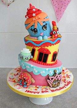 Topsy Turvy Shopkins Cake